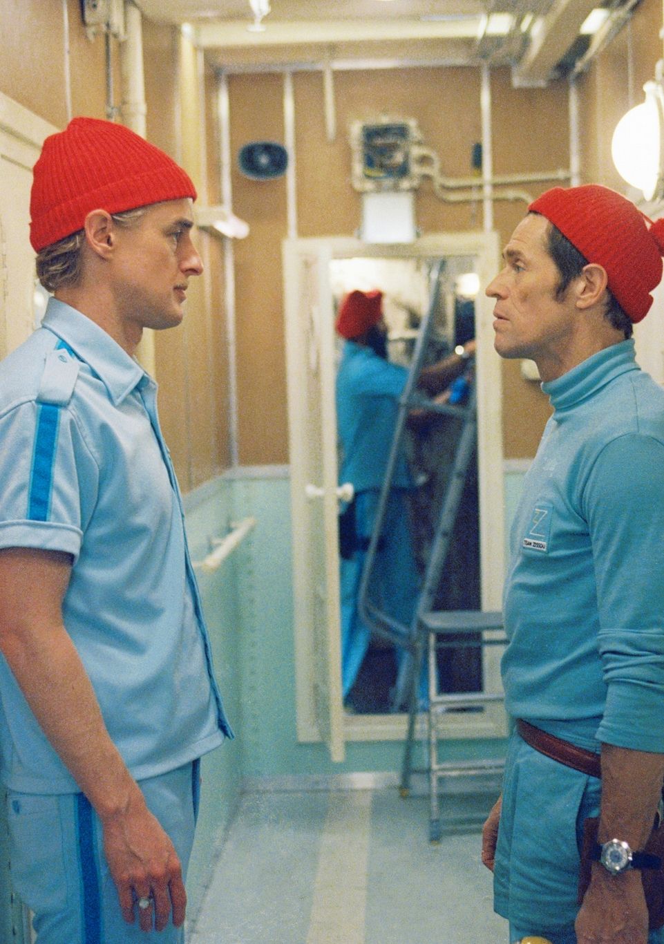 Two styles of red cap in Life Aquatic