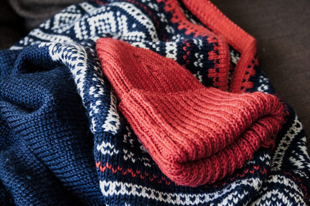 Red beanie on Norwegian traditional sweater.