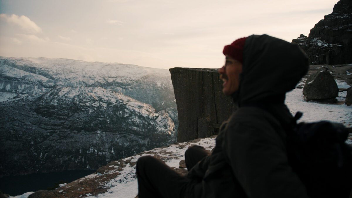 The wool beanie in the mountains.