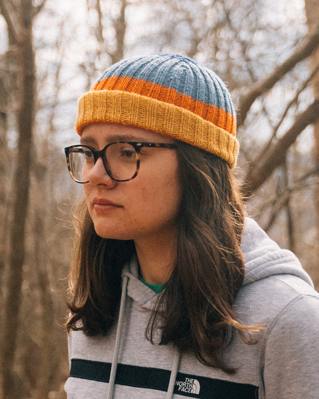 Sustainable wool beanie slanted front look left.